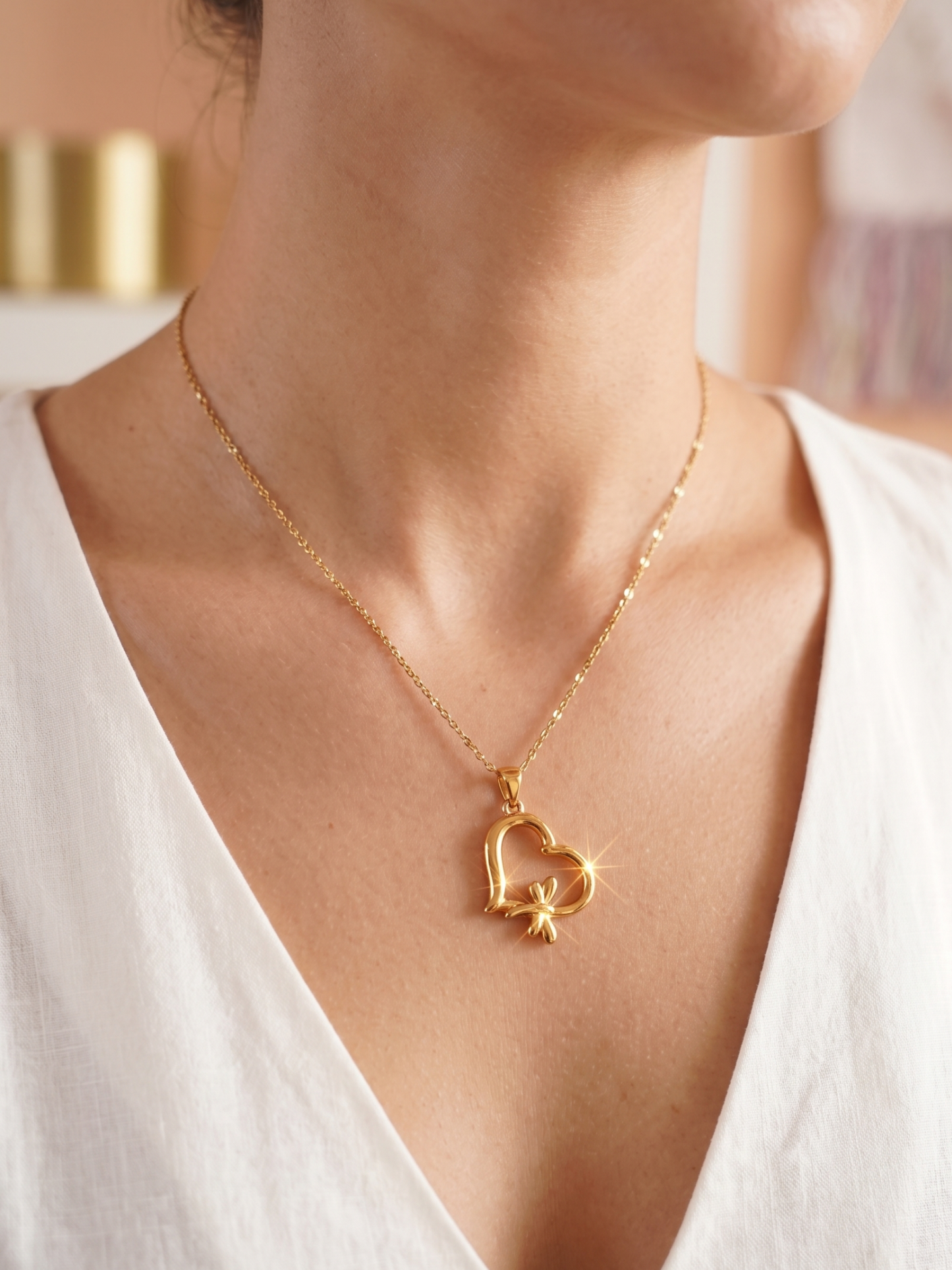 Gold necklace with a heart pendant