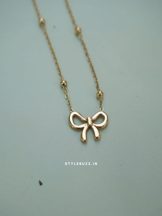 Anti Tarnish Gold Tone Fancy Bow Designed Necklace