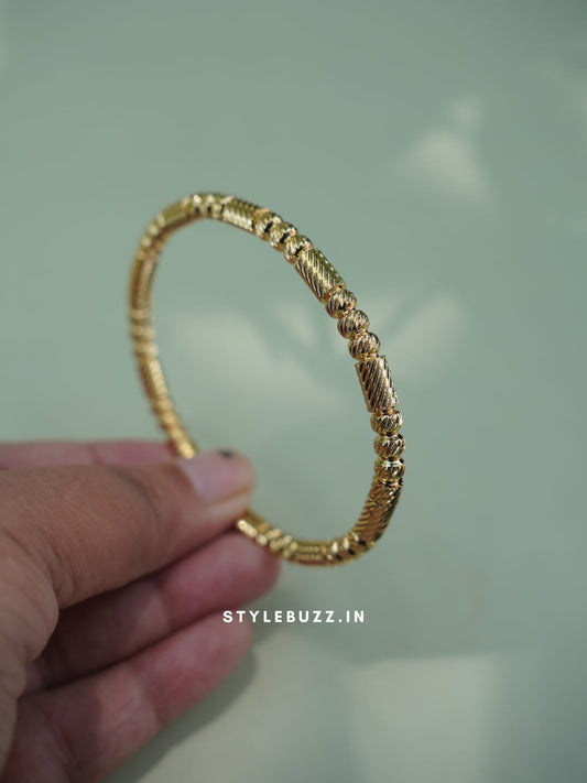 Anti Tarnish Gold Toned Classic Designed Fancy Bangle