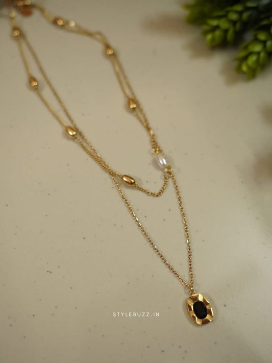 Anti Tarnish Gold Toned Oval Black Stoned Necklace With Double Chain