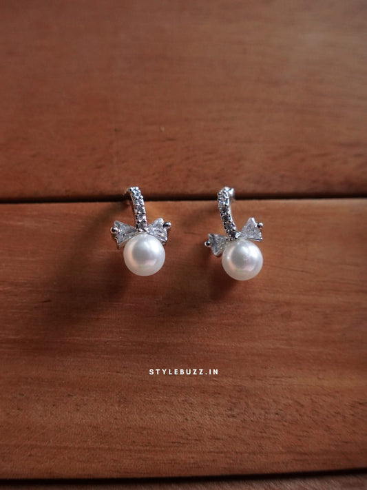 Anti Tarnish Silver Tone Pearl Bow Designed Earrings For Woman
