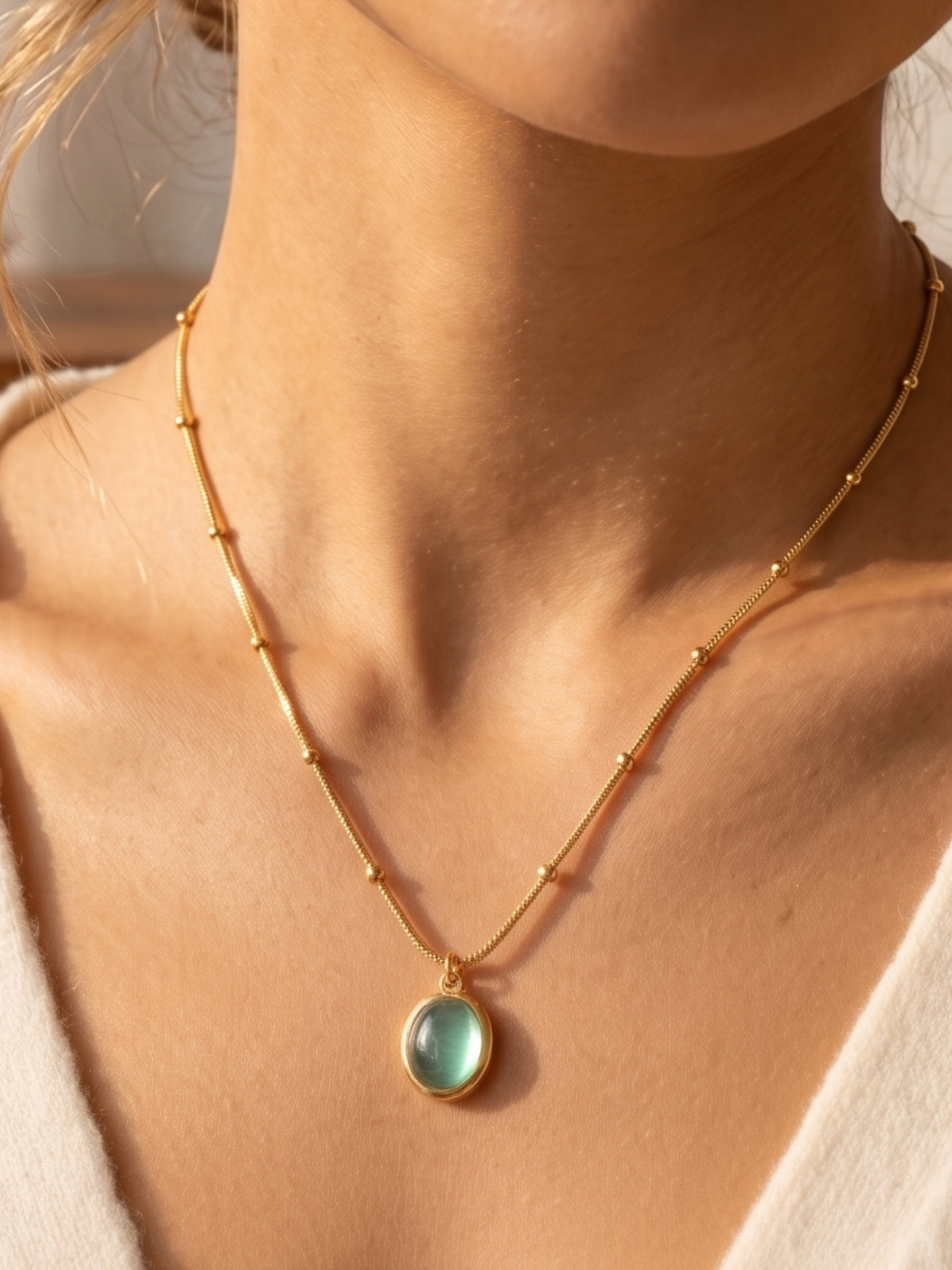 anti tarnish Necklace with a green pendant worn