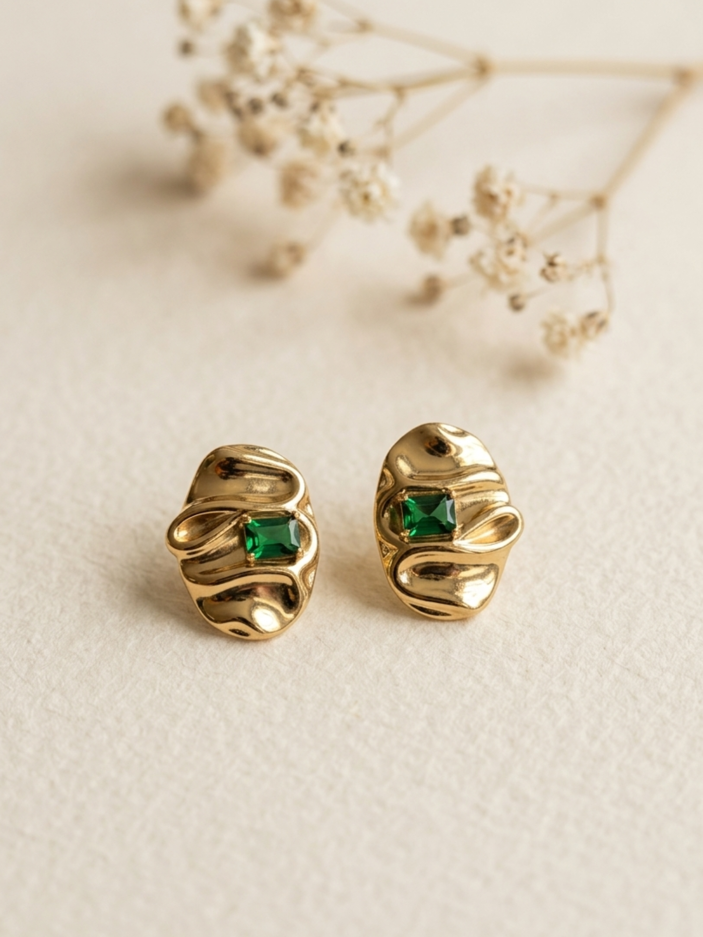 Anti tarnish statement stud with green stone