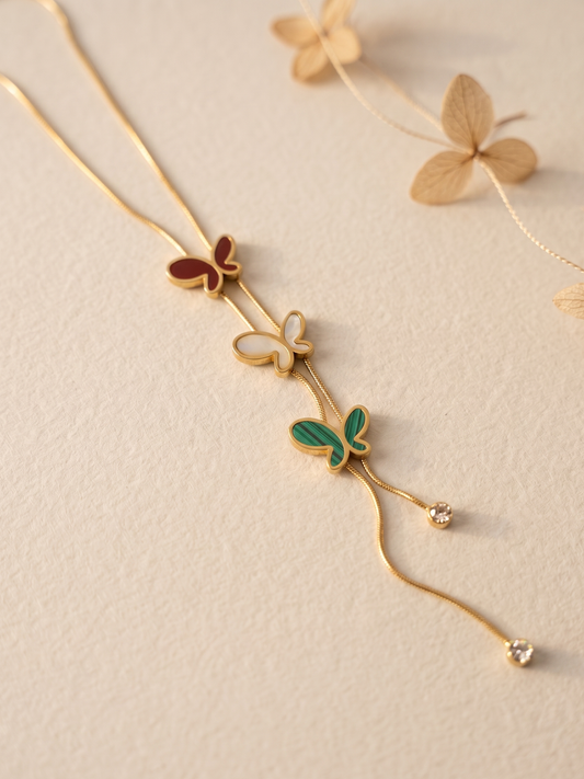 Delicate anti tarnish necklace with butterfly and leaf pendants