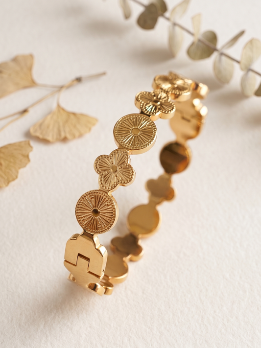 Gold bracelet with floral patterns