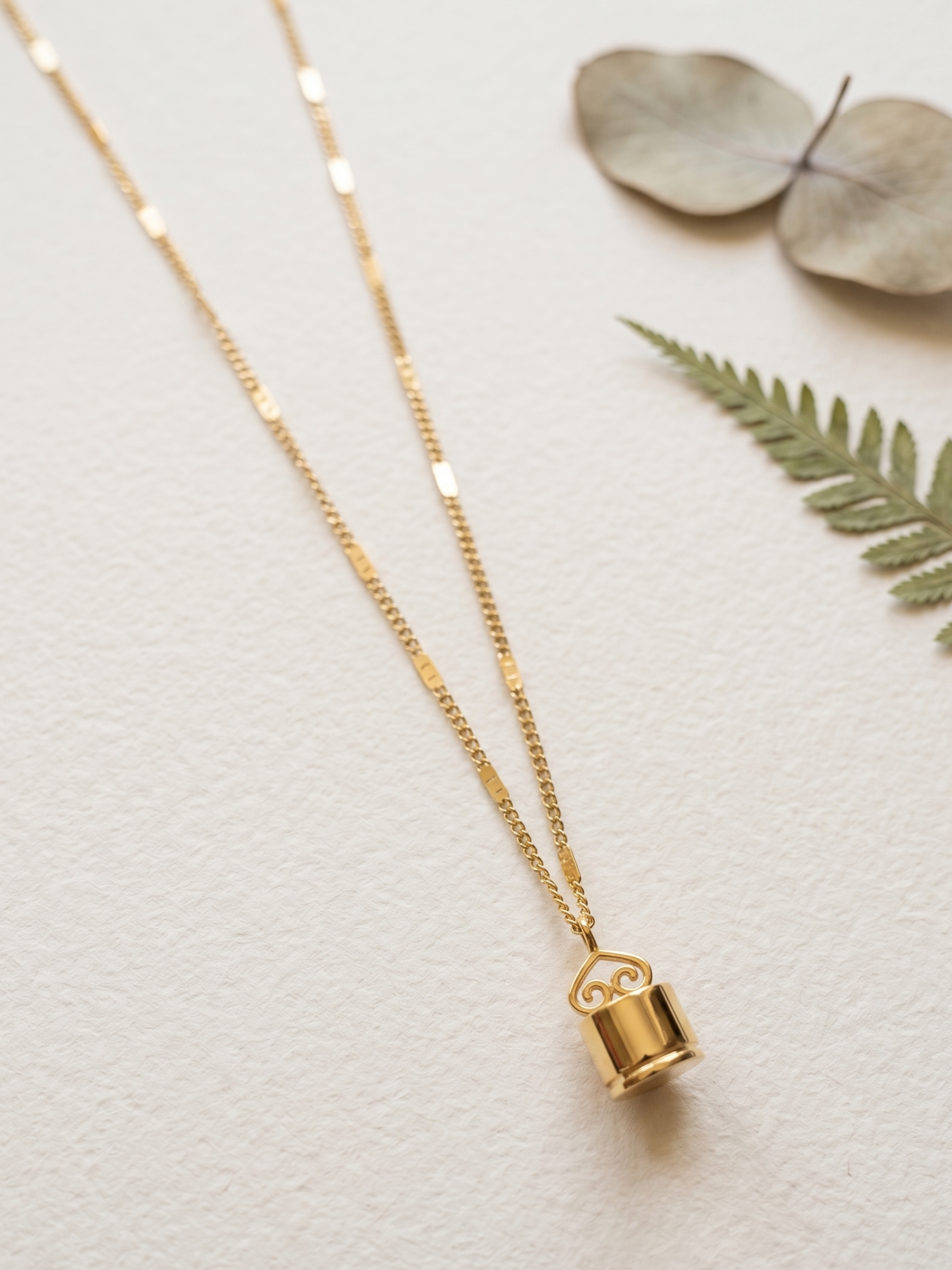 Gold necklace with a pendant