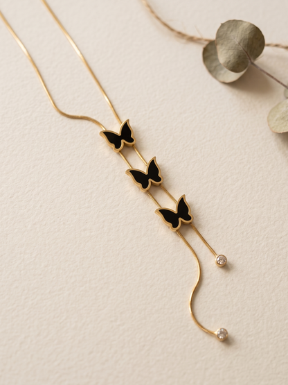 Gold necklace with butterfly pendants
