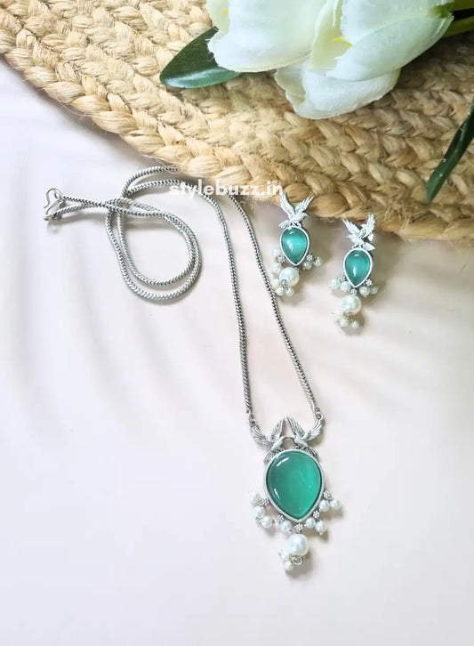 Premium-Quality Green Monalisha Stone Silver Replica Necklace with matching Earrings.