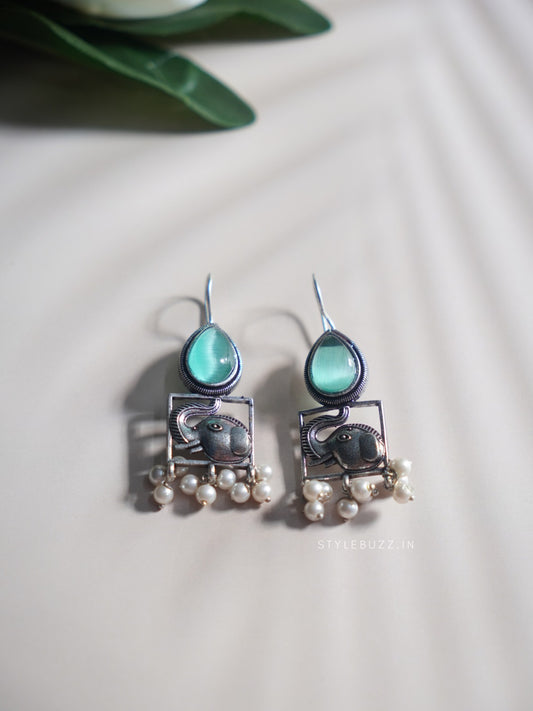 Silver Replica Elephant Danglers with Sea Green Stone