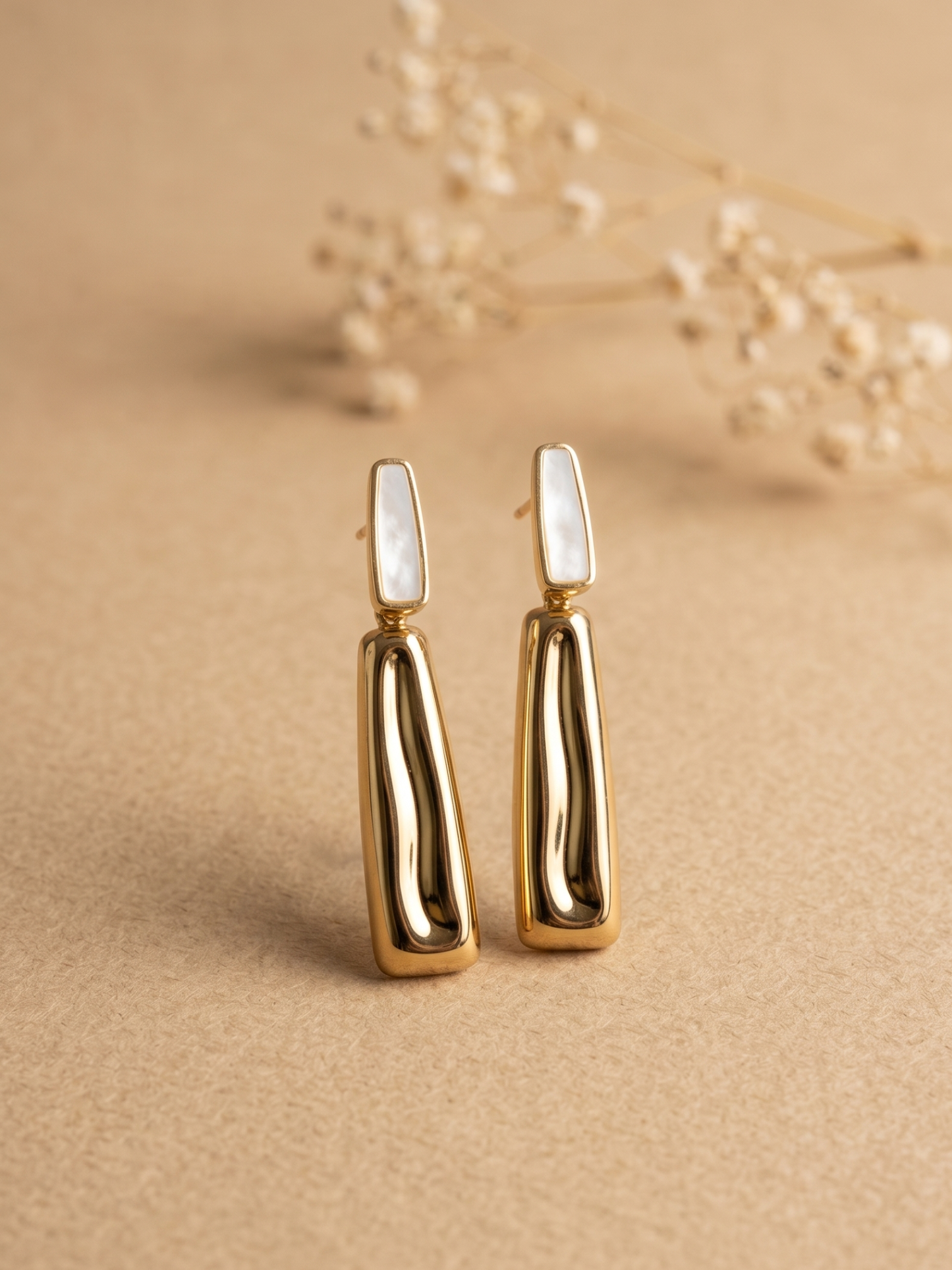 Waterproof statement earring with MOP
