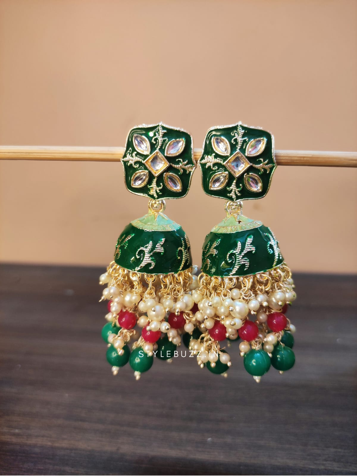 Deep Green Colored Minakari Earrings With White Stone