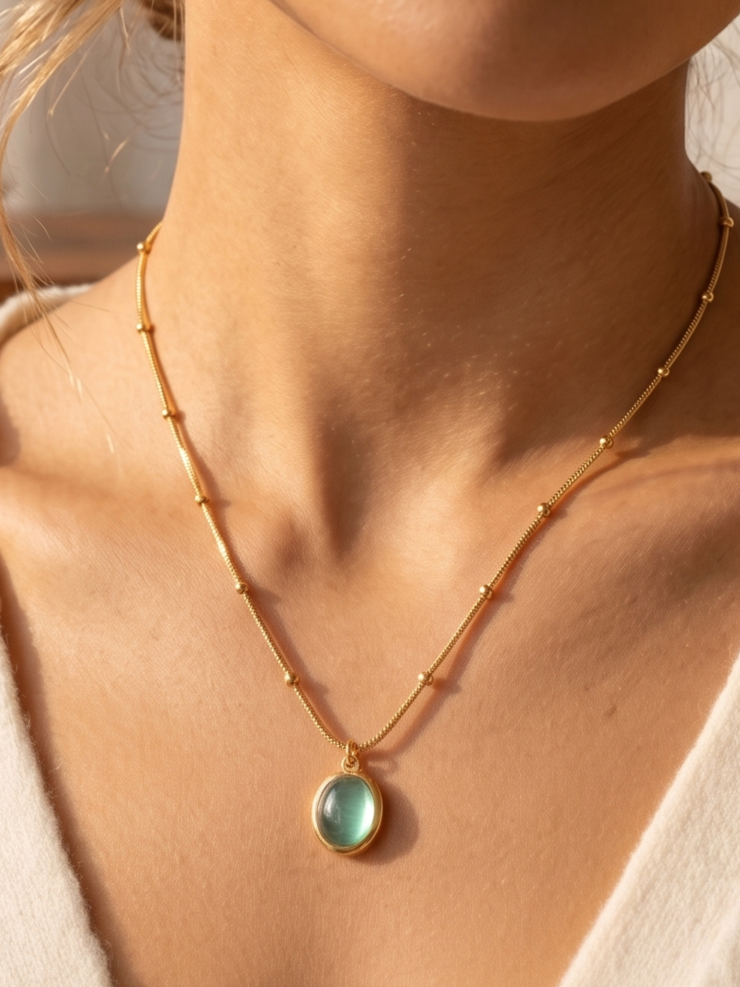 anti tarnish Necklace with a green pendant worn