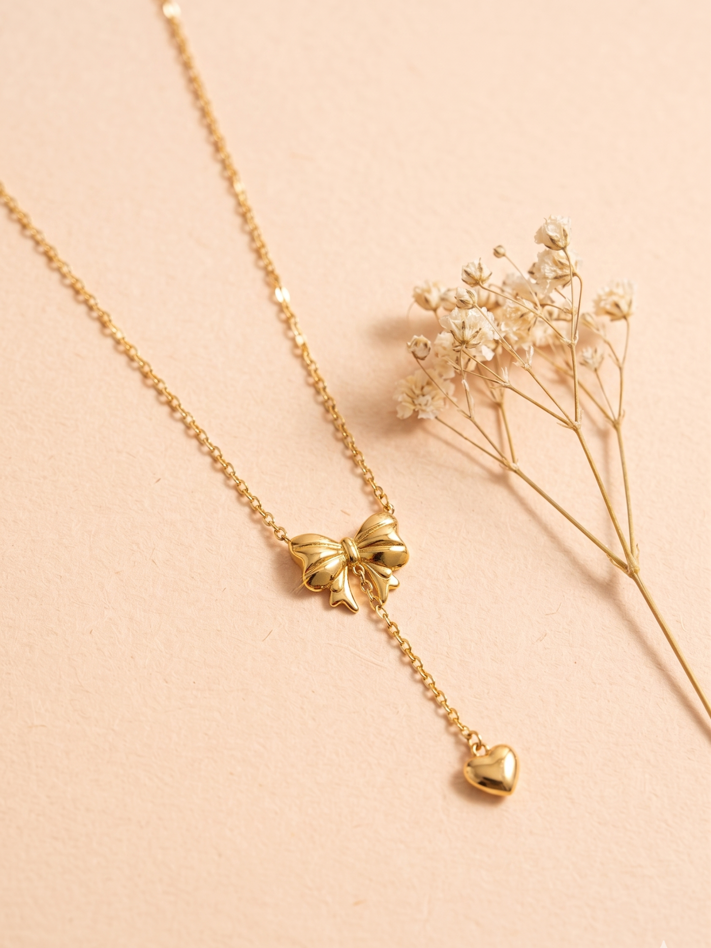 anti tarnish bow necklace