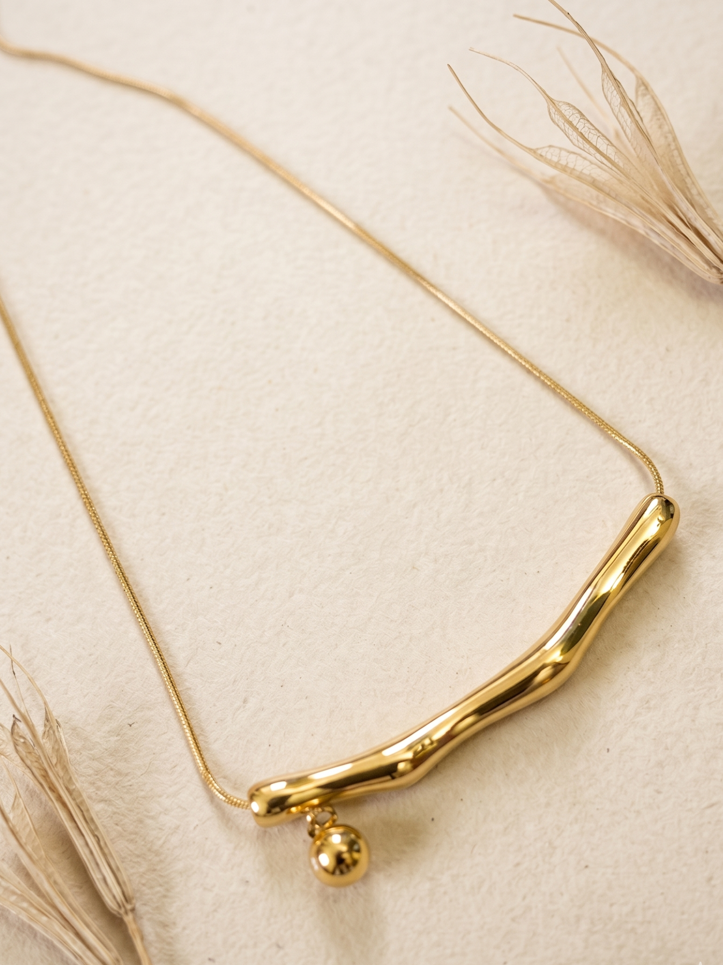 anti tarnish flute necklace