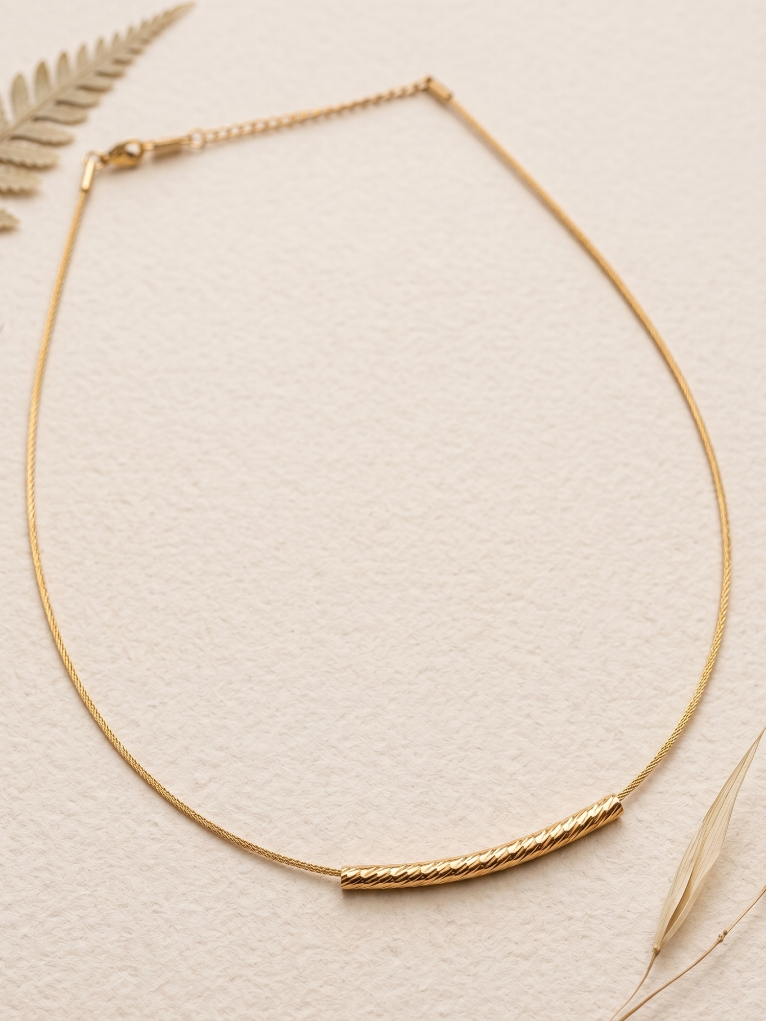 anti tarnish hasli necklace with a textured bar pendant 
