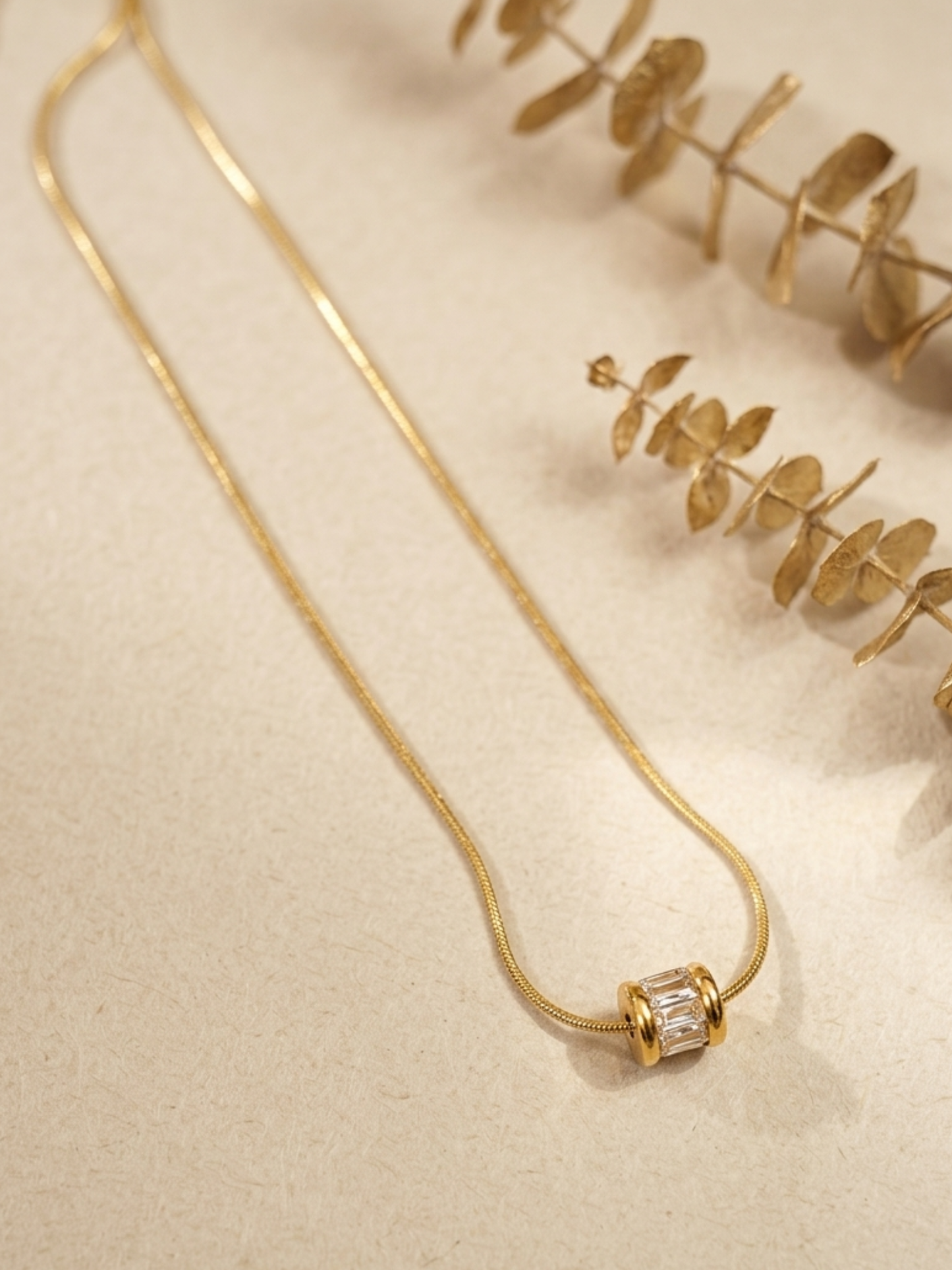 anti tarnish necklace with a clear gemstone pendant