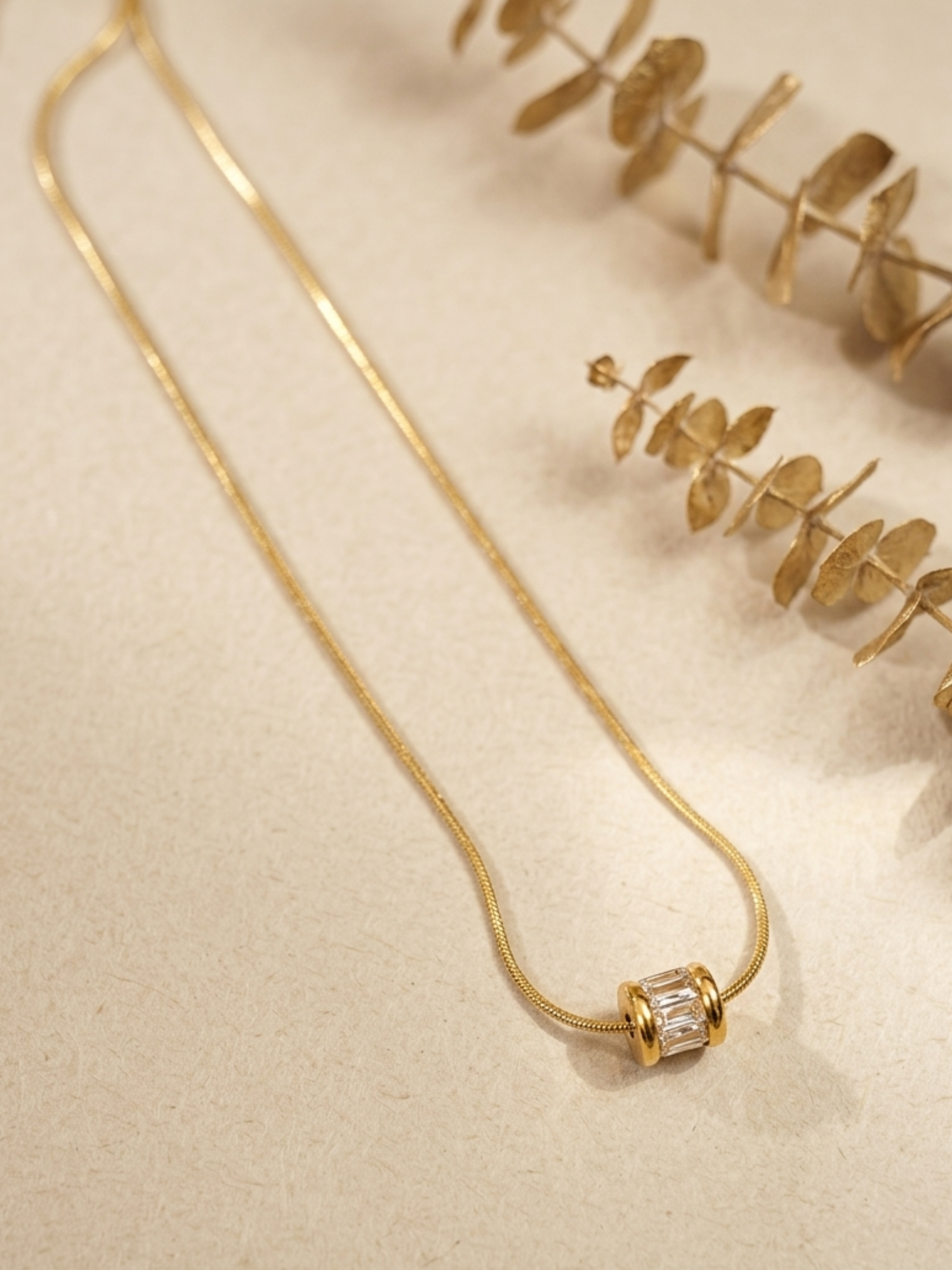 anti tarnish necklace with a clear gemstone pendant
