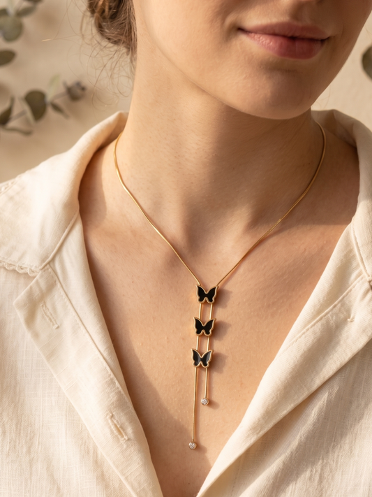 Gold necklace with butterfly pendants